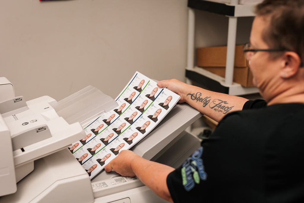 Custom engraver for trophies at Strand360 in Red Deer, Alberta – perfect for corporate awards and recognition.